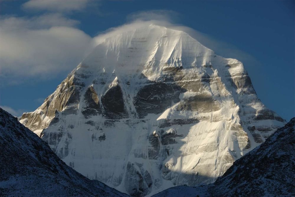 Close-up of snow-covered Mount Kailash peak