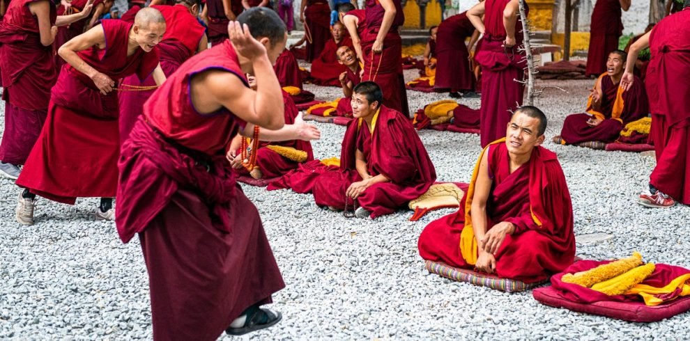 Monks debating at Sera Monastery courtyard