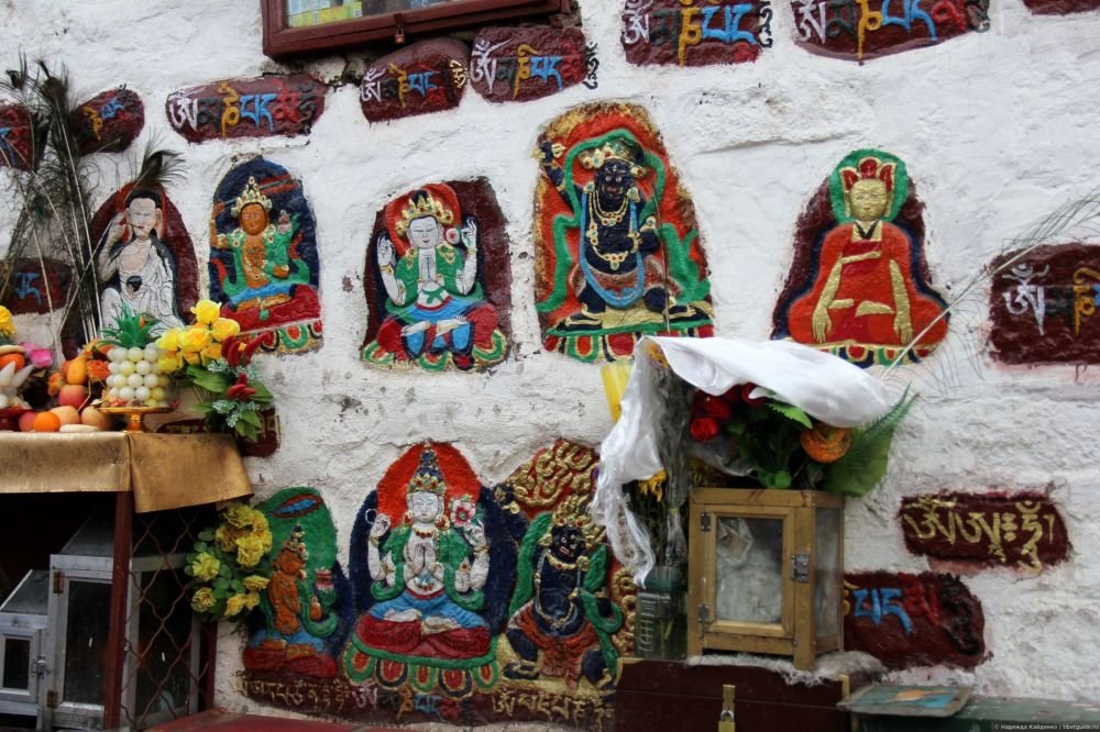 Colorful religious carvings on Barkhor Street, Lhasa