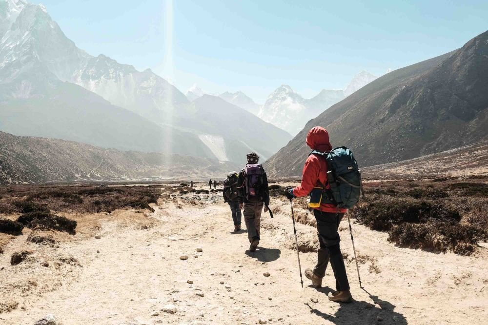 Hikers trekking in the Himalayas near Mount Everest