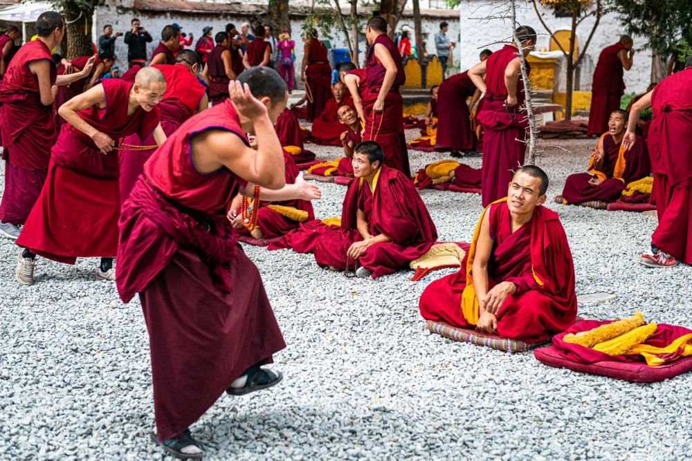 Monks debating at Sera Monastery courtyard