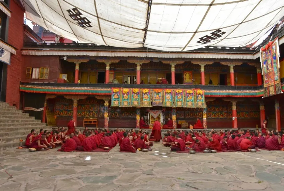Monks in courtyard at Tashi Lhunpo Monastery